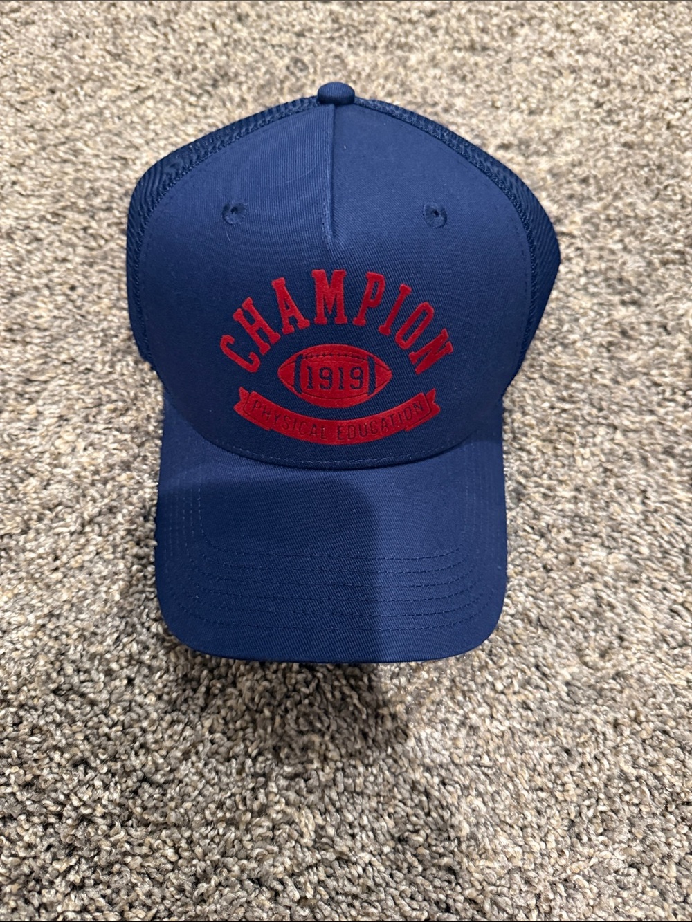 Champion Navy Blue Trucker Hat with Red Embroidered Logo